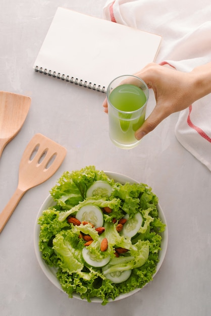 Fresh salad with tomatoes, cucumbers and lettuce