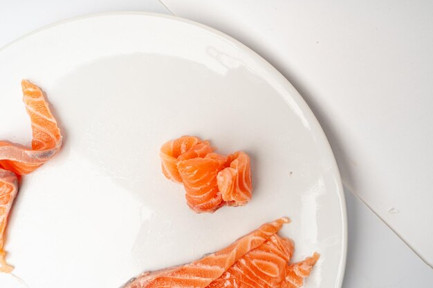 Photo fresh salmon fillet slice isolated raw norwegian red fish trout meat piece on white