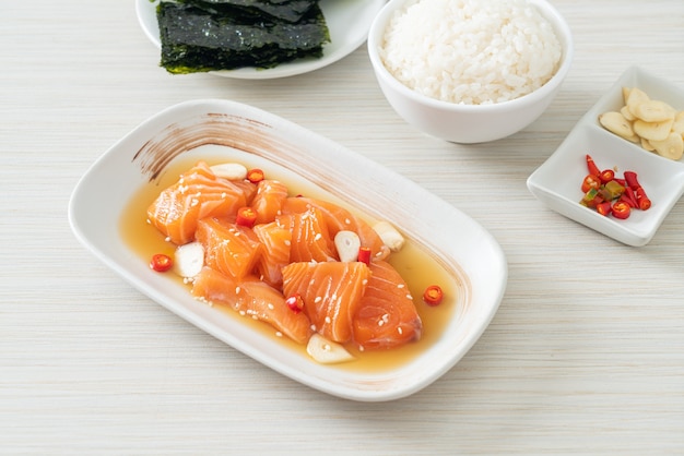 fresh salmon raw marinated shoyu or salmon pickled soy sauce - Asian food style