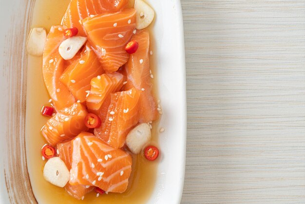 fresh salmon raw marinated shoyu or salmon pickled soy sauce - Asian food style