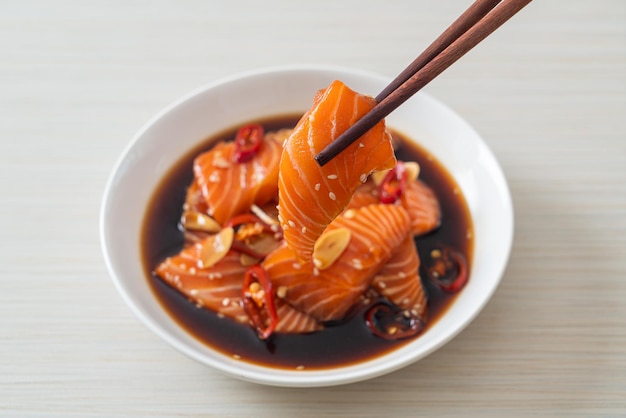 Fresh salmon raw pickled in shoyu sauce