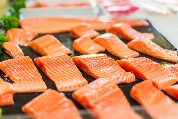 Fresh salmon slide on shelf in supermarkets