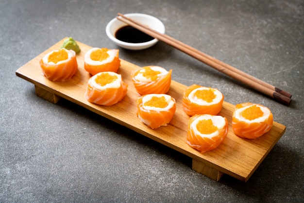 fresh salmon sushi roll with mayonnaise and shrimp egg