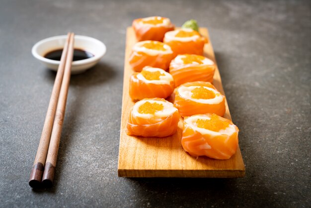 fresh salmon sushi roll with mayonnaise and shrimp egg