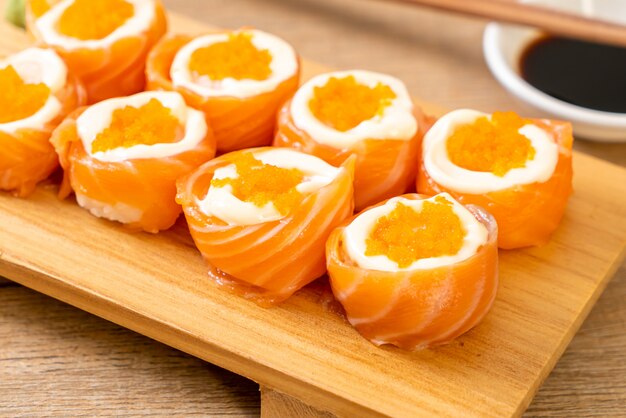 fresh salmon sushi roll with mayonnaise and shrimp egg