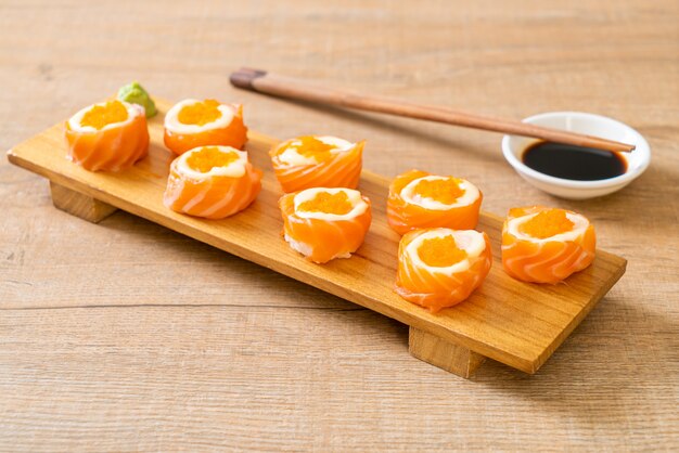 fresh salmon sushi roll with mayonnaise and shrimp egg