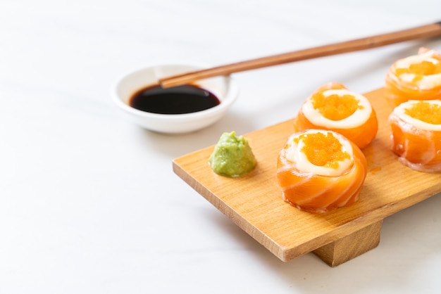 fresh salmon sushi roll with mayonnaise and shrimp egg