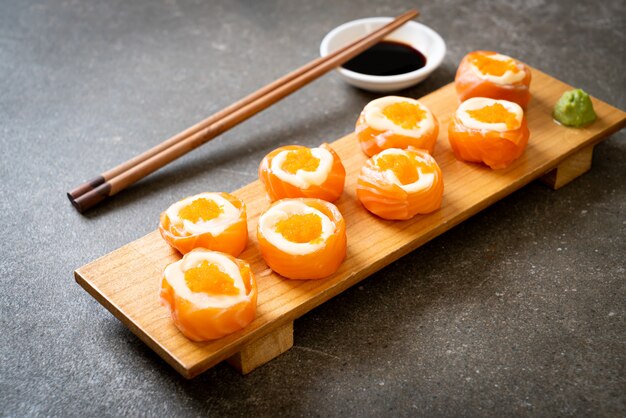 fresh salmon sushi roll with mayonnaise and shrimp egg