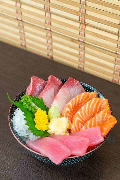 fresh salmon, tuna and hamachi on topped rice bowl (donburi)