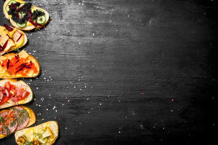 Photo fresh sandwiches from seafood with salmon, caviar, bacon and vegetables
