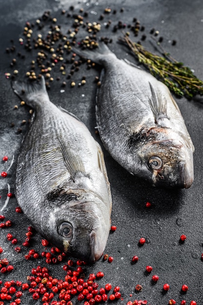 Fresh sea bream fishes and spices