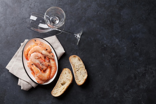 Fresh seafood on stone table Shrimps