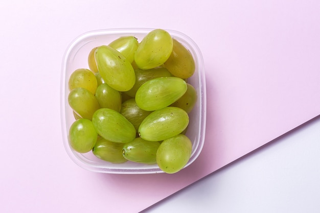 Fresh seasonal grapes in Plastic container