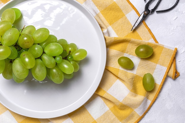 Fresh seasonal grapes in Plastic plate