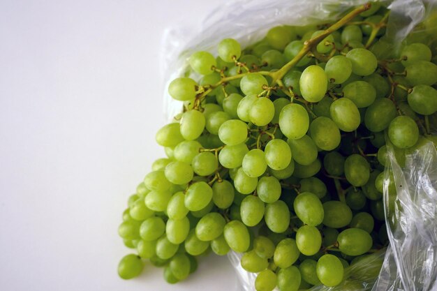 fresh seedless bunch grapes on a white background