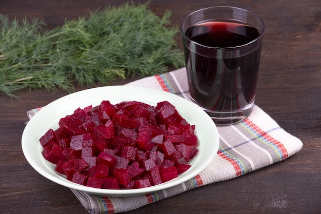 Fresh segments of a beet and beetroot juice