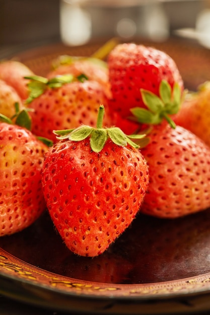Fresh selected strawberry on plate