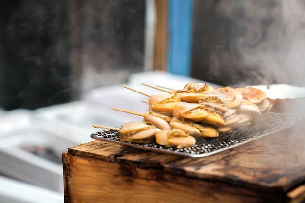 Fresh shellfish at fish market, Japan.