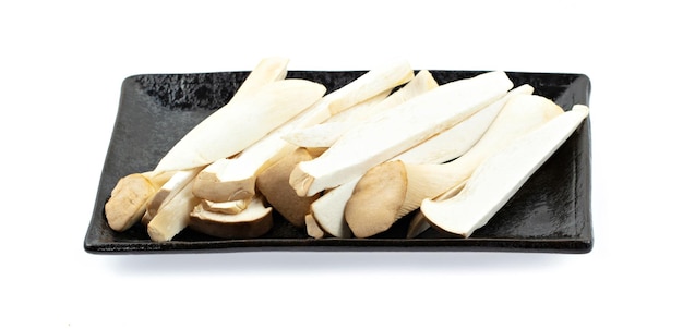 fresh Shimeji Mushroom on stone plate isolated on white background