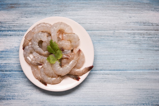 Fresh shrimps or prawns on white plate