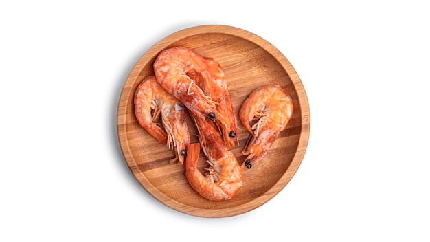 Fresh shrimps on a wooden board