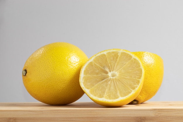 Fresh Sicilian lemons on cutting board.