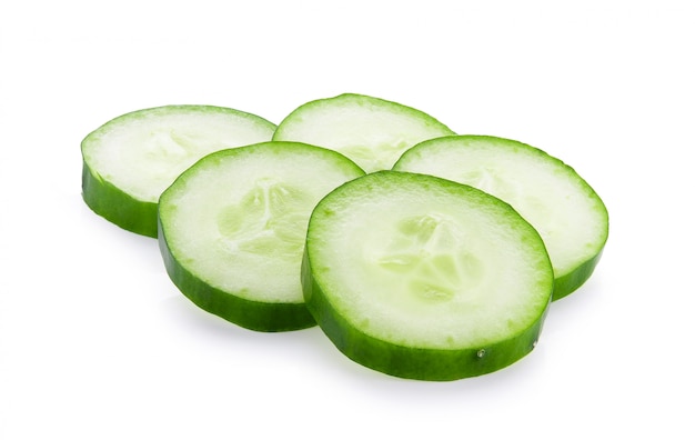 Fresh slice cucumber close-up on a white surface