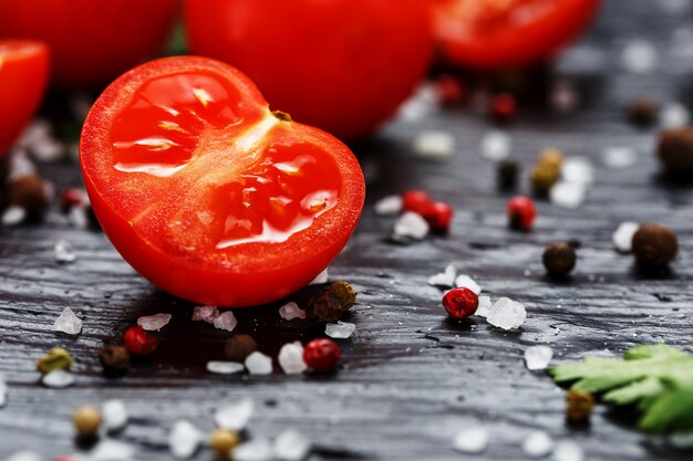 Fresh Sliced Cherry Tomatoes with spices coarse salt and herbs