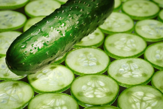 Fresh sliced cucumber and cucumber closeup Fresh organic vegetables