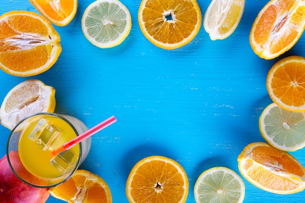 Fresh sliced fruit on a wooden blue