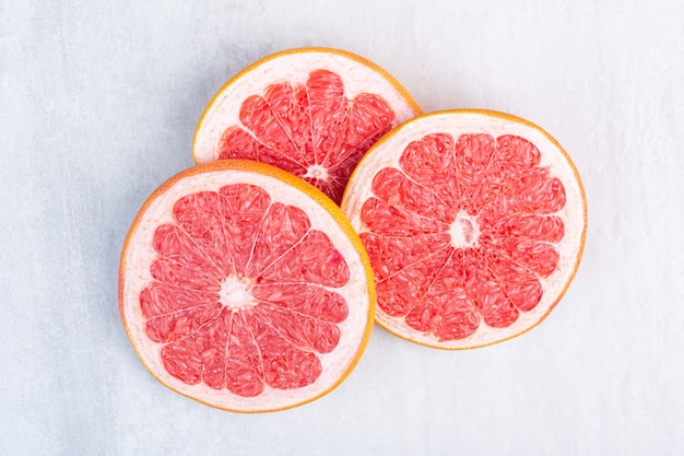 Fresh sliced grapefruit , on the marble.