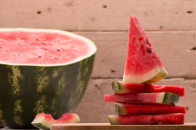 Fresh sliced watermelon  on rustic  table