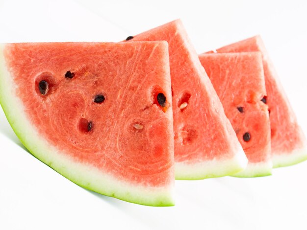 Fresh slices of watermelon on white background.