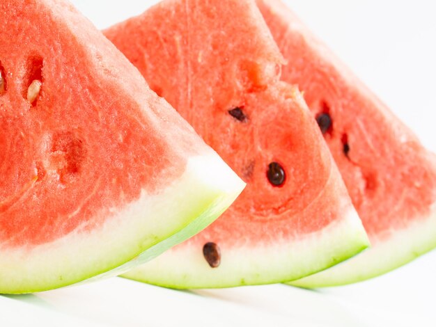 Fresh slices of watermelon on white background.