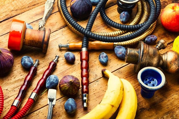 Fresh smoking shisha with fruit.Oriental hookah on fruit tobacco.Smoking hookah