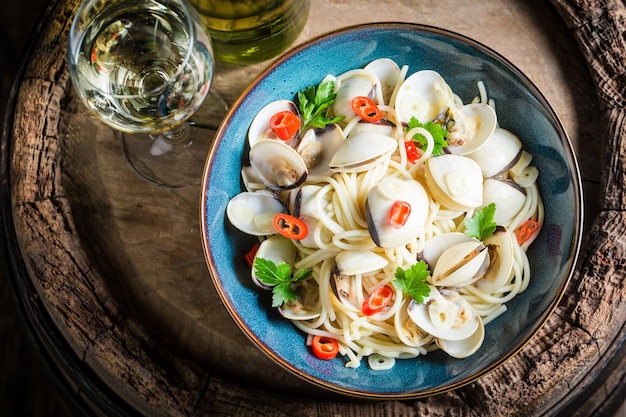 Fresh spaghetti Vongole with clams parsley and peppers