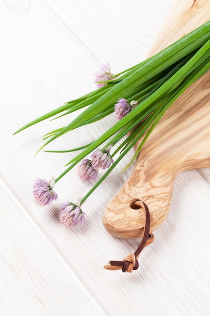 Fresh spring onion on cutting board