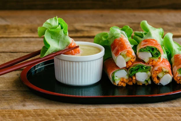 Fresh spring rolls with fresh vegetable and crab stick with wasabi mixed salad cream 