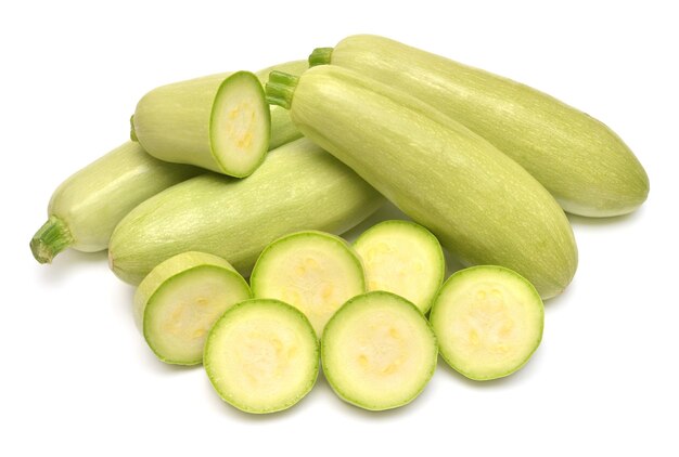 Fresh squash vegetable marrow zucchini whole and rings isolated on white background Flat lay top view