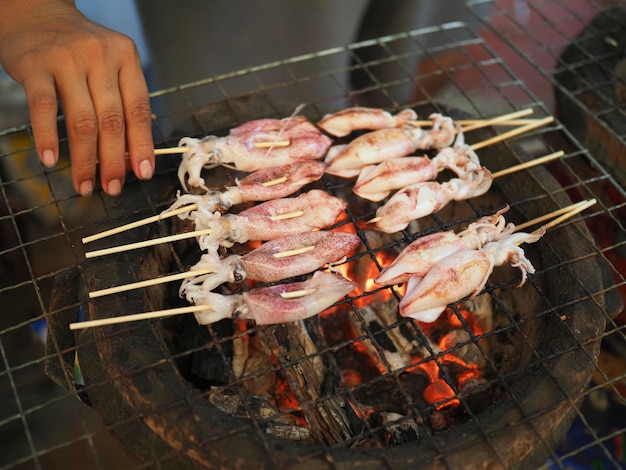 Fresh squid grill on old style charcoal stove