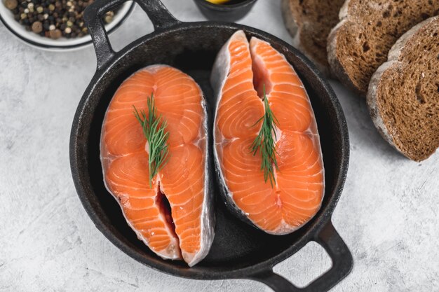 Fresh steaks of red salmon with spices