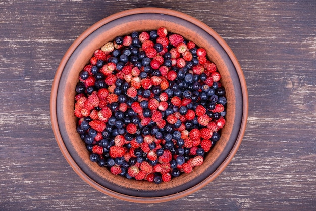 Fresh strawberries and blueberries wild berry Close up