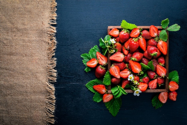 Fresh strawberries Healthy food On Wooden background Top view Free space