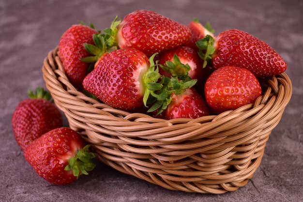 Fresh strawberries in a wicker basketCloseup