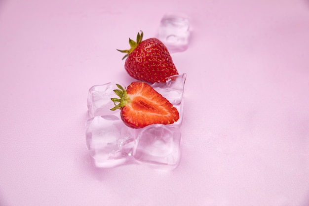 Fresh strawberries with ice cubes