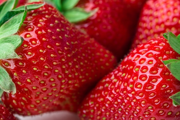 Fresh strawberry background ripe in closeup