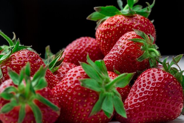 Fresh strawberry background ripe in closeup