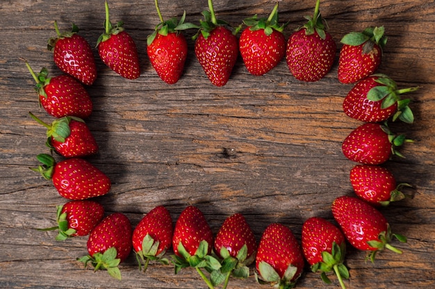 Fresh Strawberry Background on a wooden table