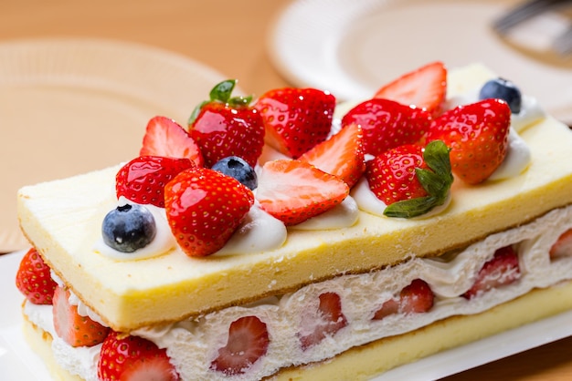 Fresh strawberry cake on the table