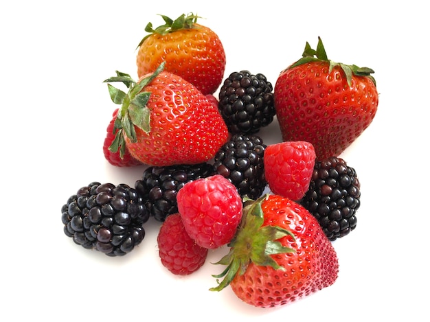 Fresh strawberry, raspberry and blackberry on wooden background, healthy food and diet.